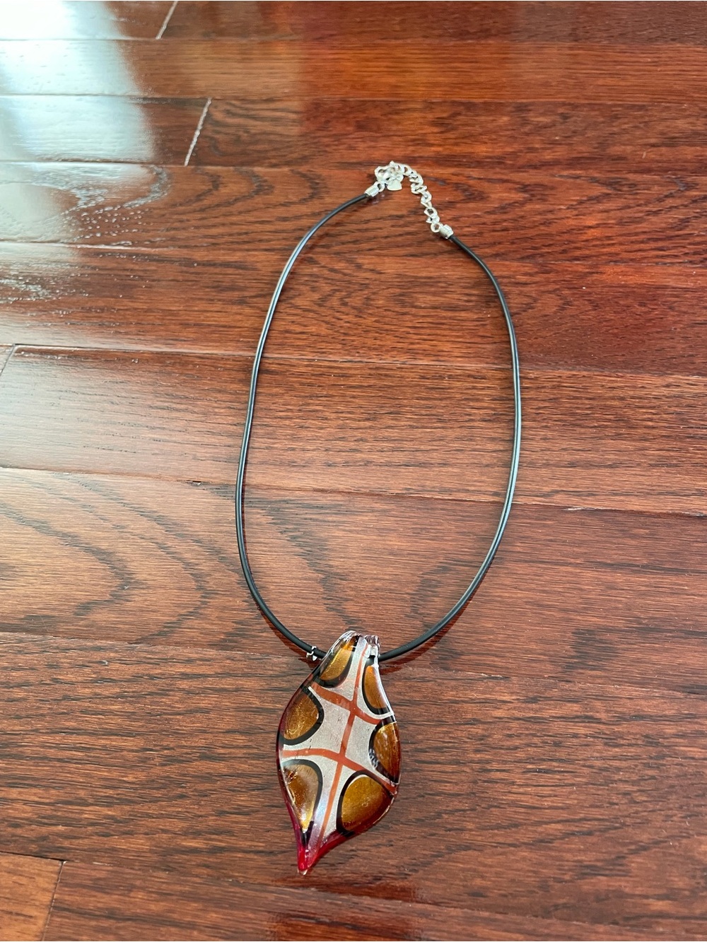 Glass Leaf Pendant Necklace in Amber and Red on Black Cord